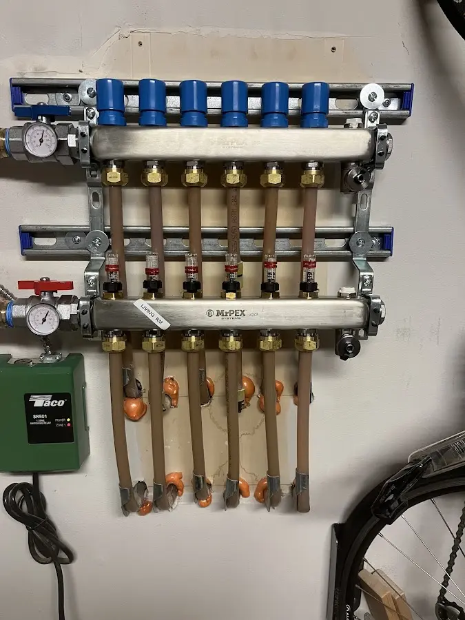 Plumber performing Water Heater Repair at a residential property in Towamensing